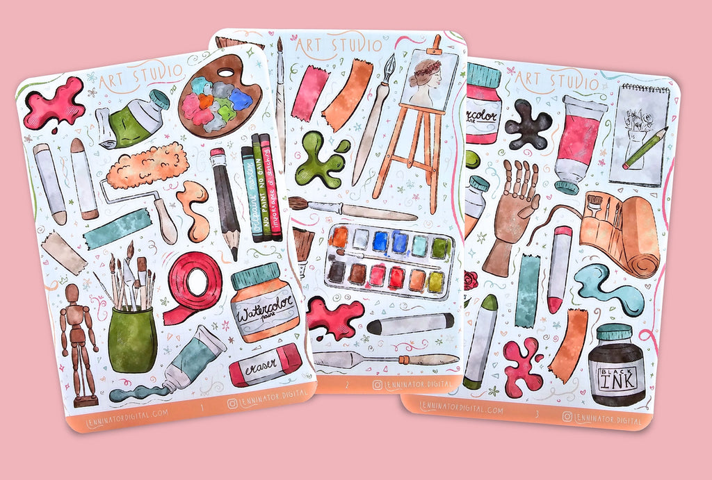 Set of art-themed stickers on a textured surface