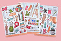 Set of art-themed stickers on a textured surface