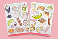 Two sheets of cats in the shape of Asian street food stickers on a textured surface