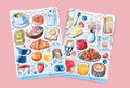 Two sticker sheets with illustrations of breakfast items on a pink background