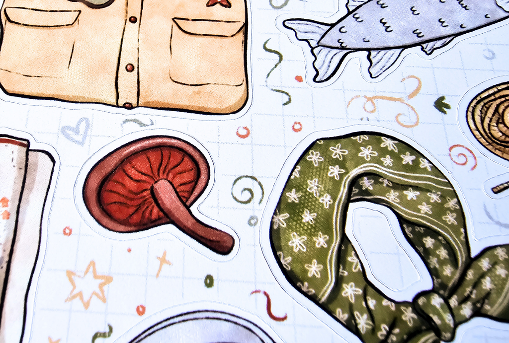 Colorful illustration of a shirt, mushroom, fish, and other items on a light background