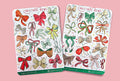 Two sheets of Christmas bow stickers on a textured surface