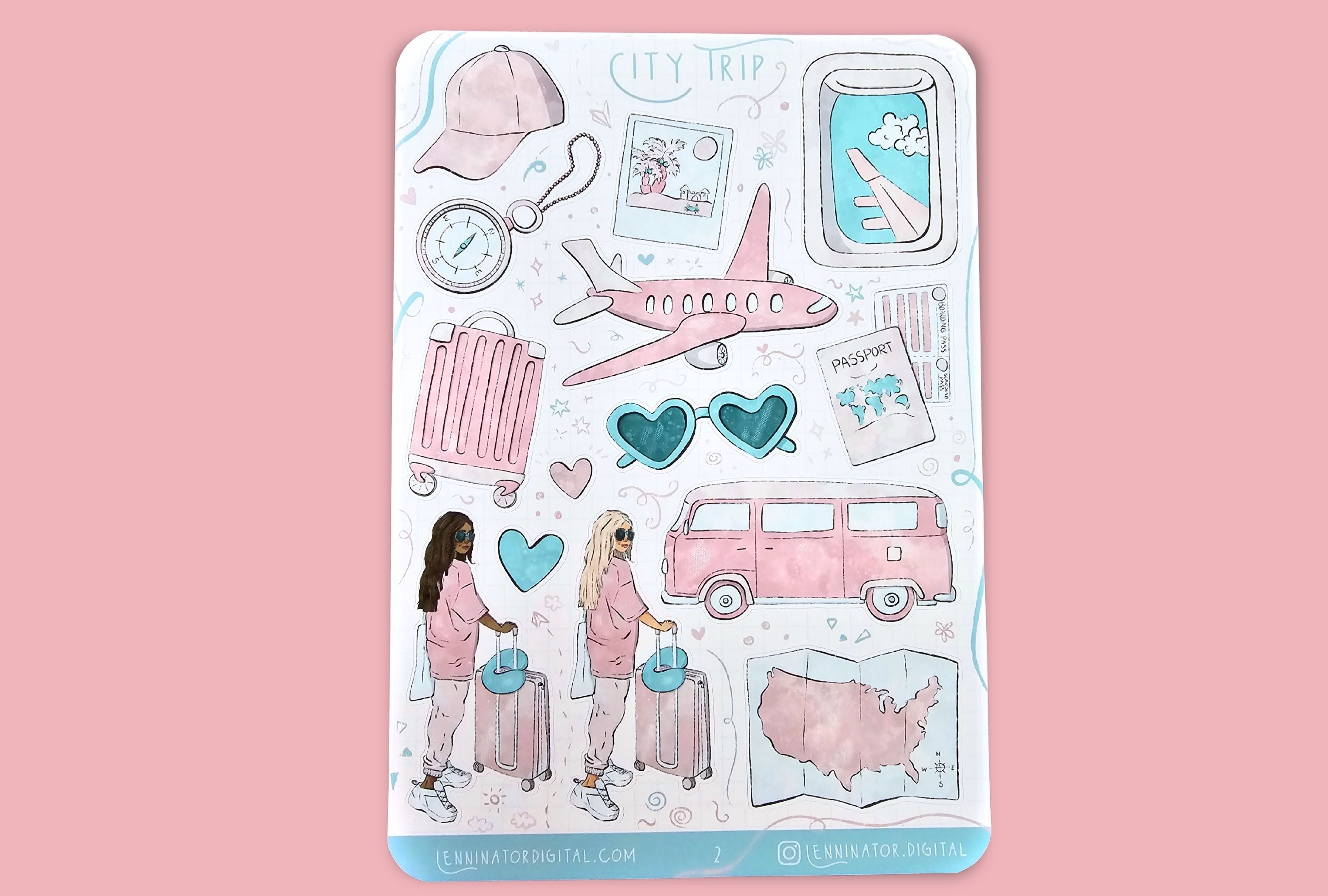 Sticker sheet with travel-themed designs on a wooden surface with travel items.