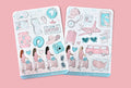 Two sticker sheets with travel-themed illustrations on a soft surface