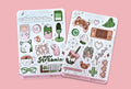 Cute Kawaii Cozy Gamer sticker sheets. Girl gamer items like keyboard, mouse, console, headset, mushroom, HP bar, Cotroller, plants, tea, microphone, and pixel heart. In the colors pinkk, green and brown.