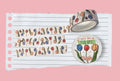 A white washi tape with a light red grid, tulips and small insects.