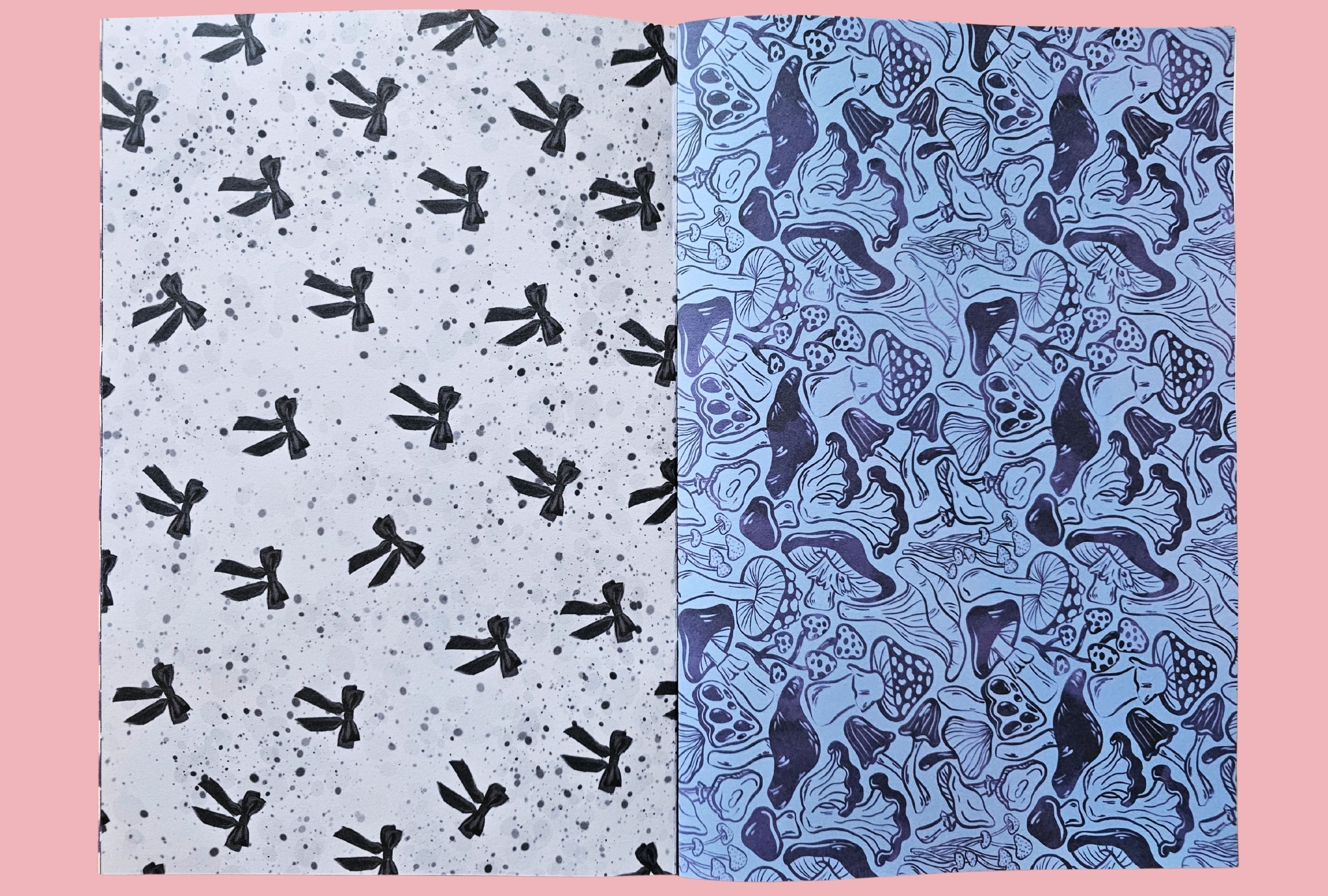 Two patterned papers with black ribbons and blue mushrooms on a pink background