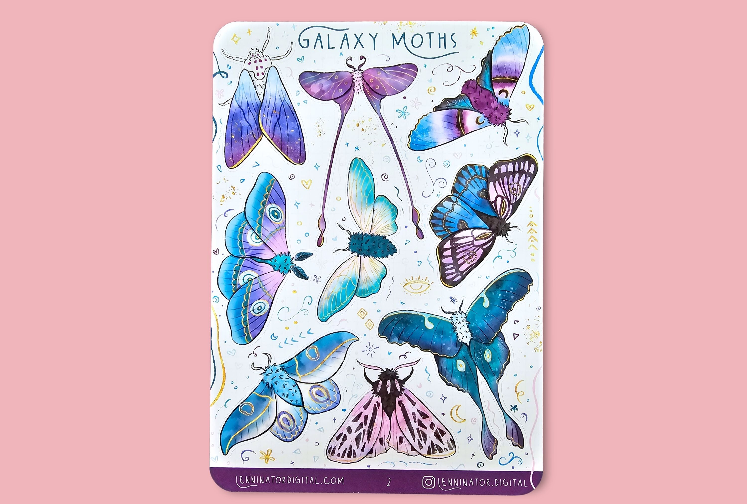 Sticker with colorful butterfly designs on a pink background with stationery items.