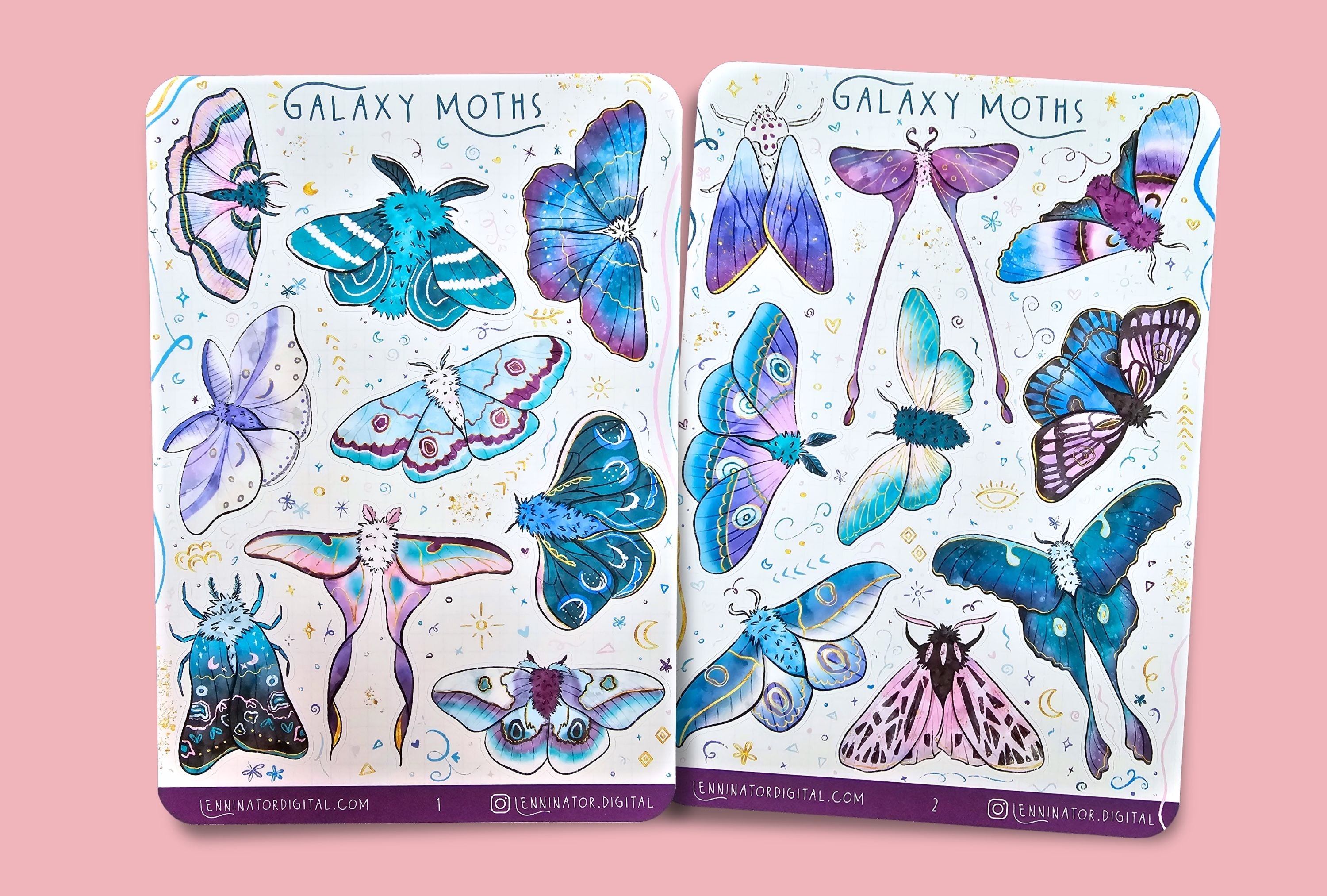 Two packages of 'Galaxy Moths' stickers on a textured surface. Matte paper stickers in blue, purple and pink with golden details.