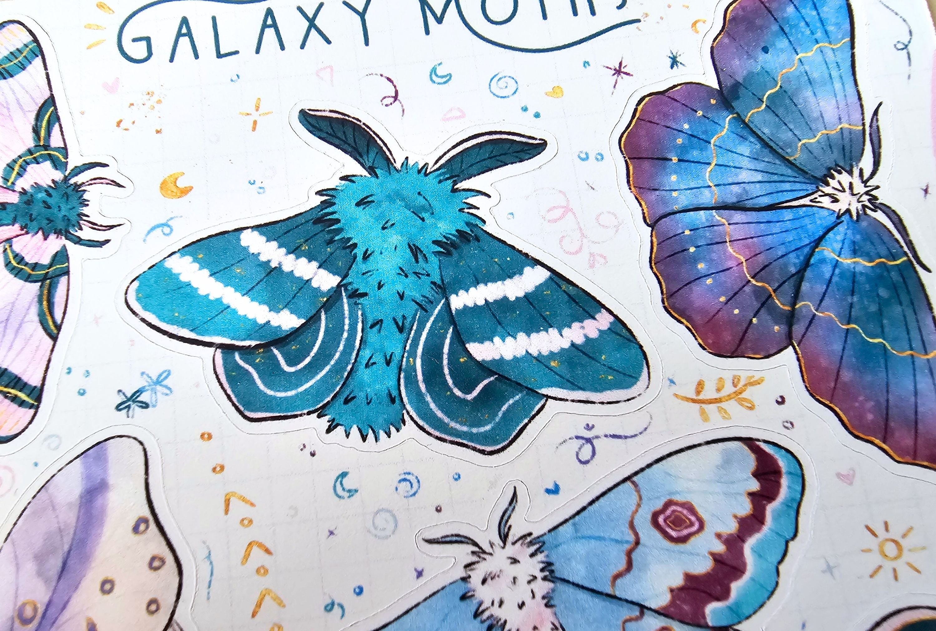 Colorful butterfly illustrations on a white background with 'Galaxy Moth' text.