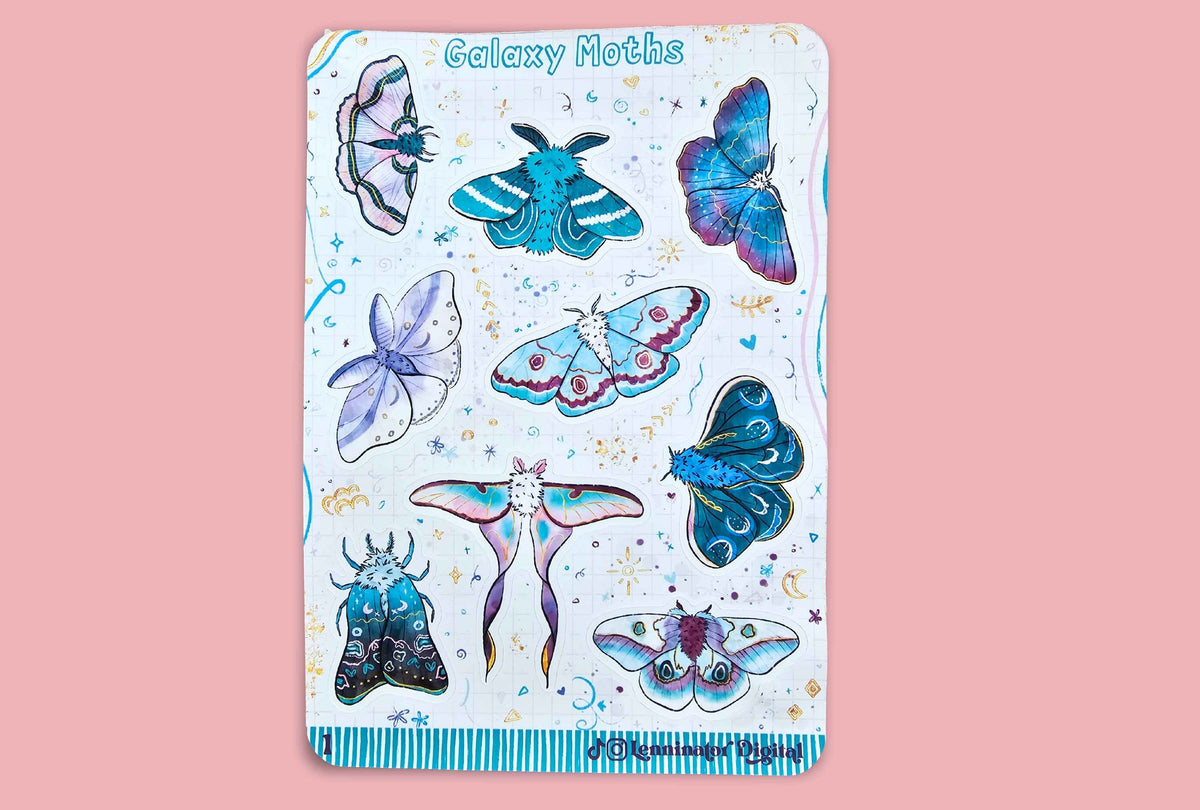 A rectangular sticker sheet titled 'Galaxy Moths' featuring various illustrated moths and butterflies in blue, purple, and pink tones on a white background with small celestial details, set against a solid pink backdrop.