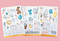 Three sheets of Easter-themed stickers on a textured surface