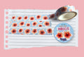 Floral washi tape with hibiscus design on a pink background