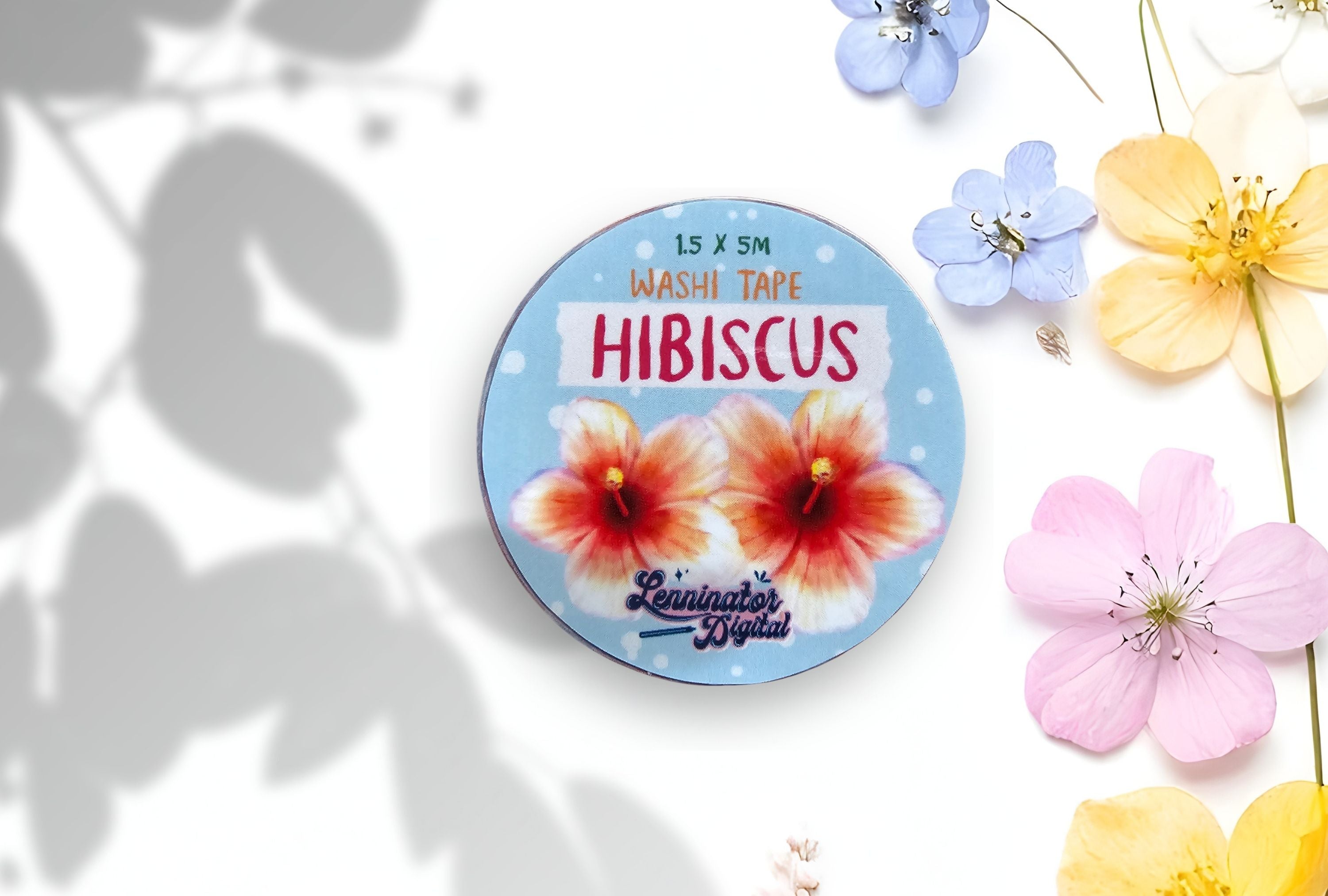 Washi tape with hibiscus design on a white background with flowers