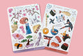 Set of two Japan sticker sheets. One in Geisha theme with a Geisha girl, Sakura / Cherry Blossom, Matcha ice cream, origami, strawberry cream sandwich, koi fish, bonsai tree, sushi in pink colors. Second in Samurai / Ninja theme with a ninja, Ninja star, bamboo, sushi, tempura, kitsune mask, lucky coin, ramen noodles bowl, Samurai helmet, and Torii
