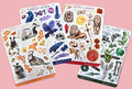 Four sticker sheets with various animal designs on a pink background. Fantasy stickers of badgers, ravens, lions and snakes.