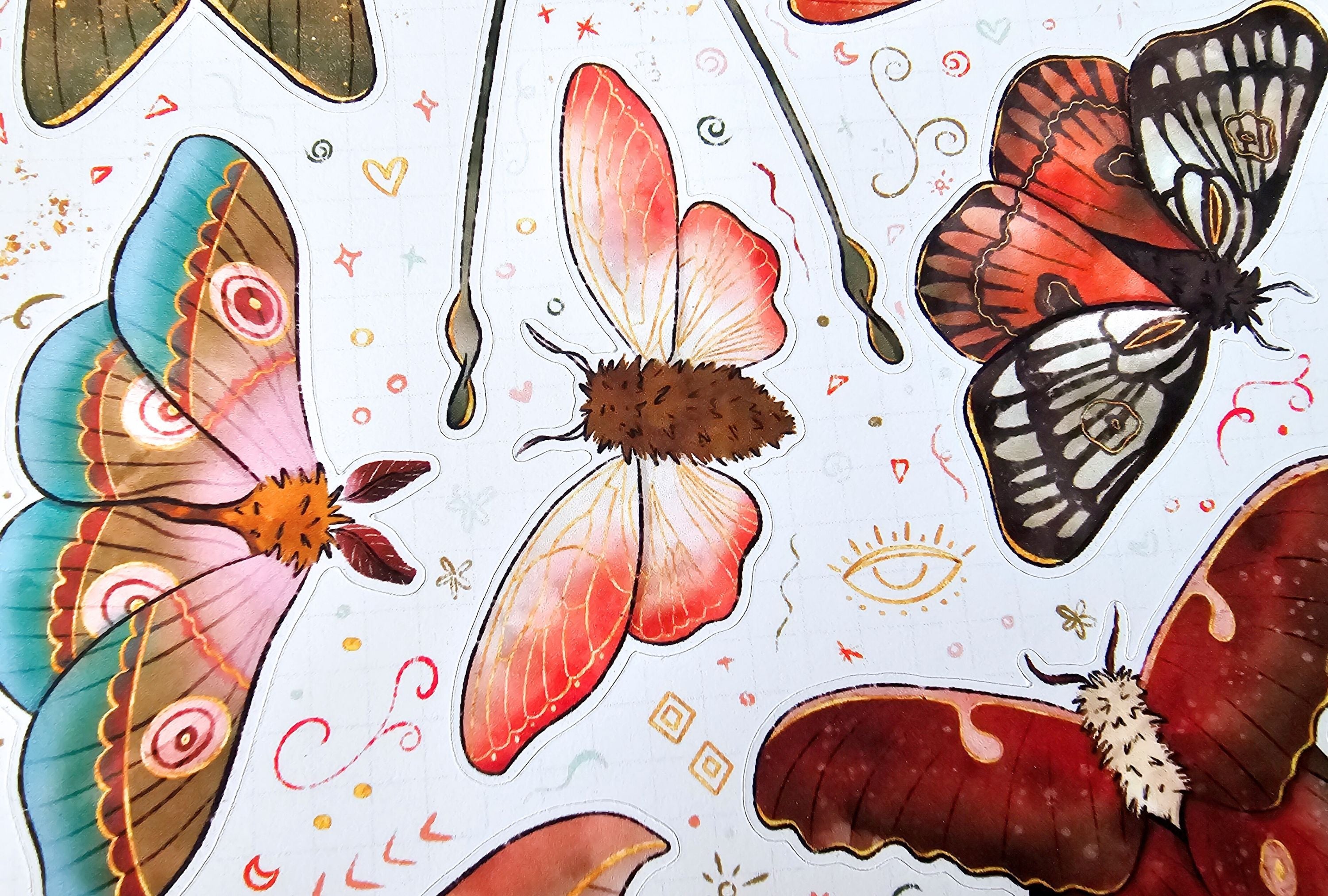 Illustration of various butterflies on a light background with decorative elements.