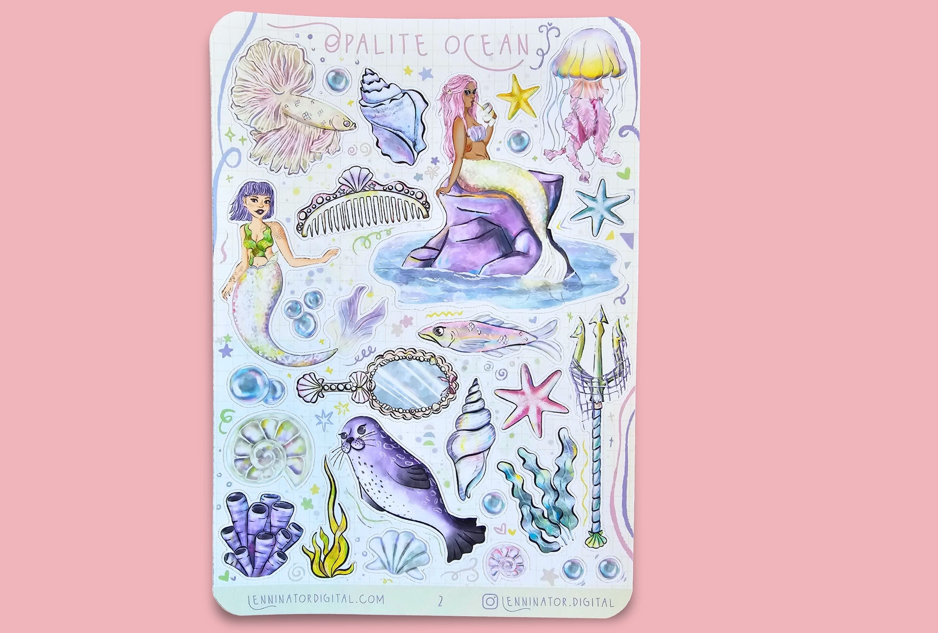 Sticker sheet with mermaid and ocean-themed designs on a pink background