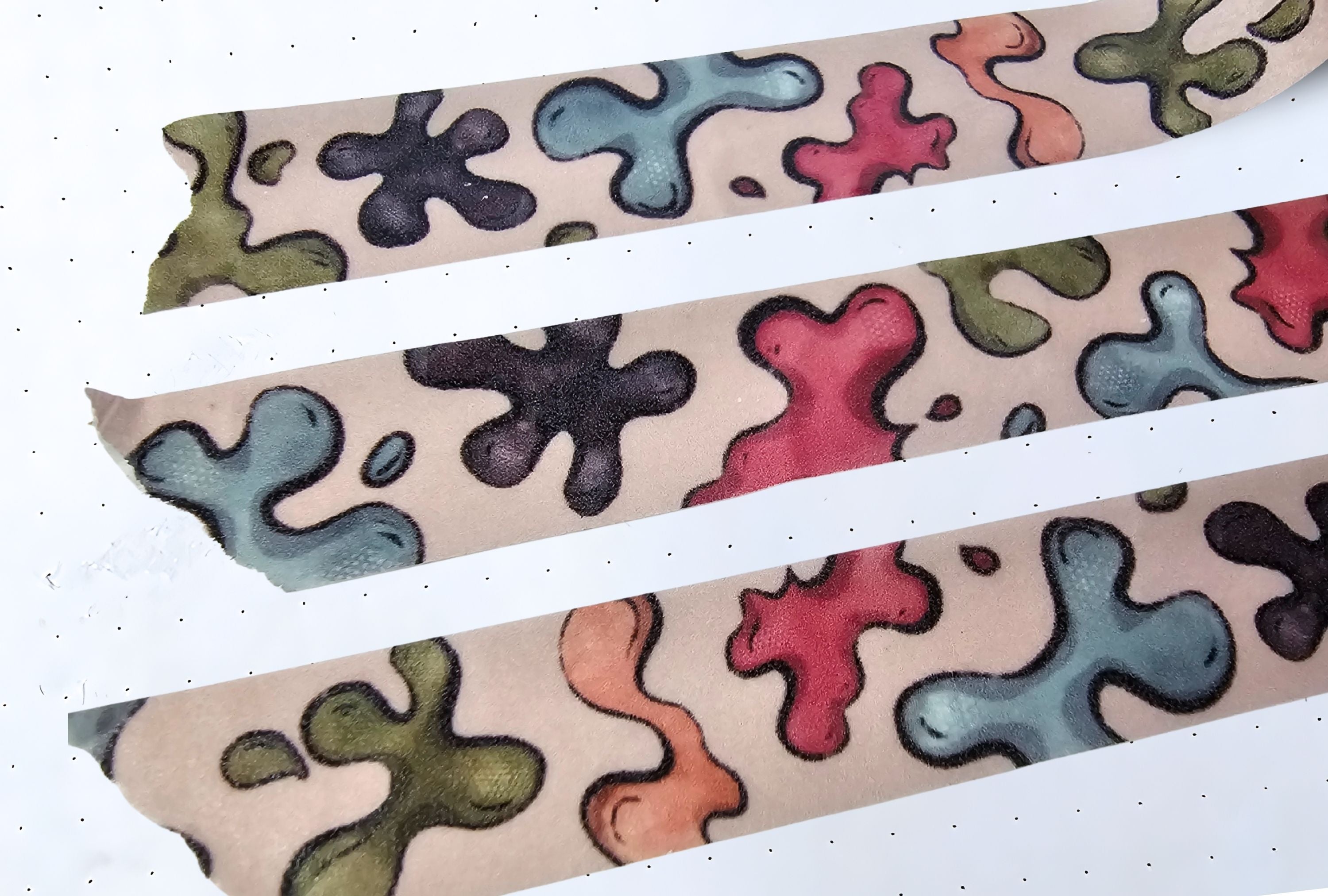 Close-up of a washi tape with paint splatters