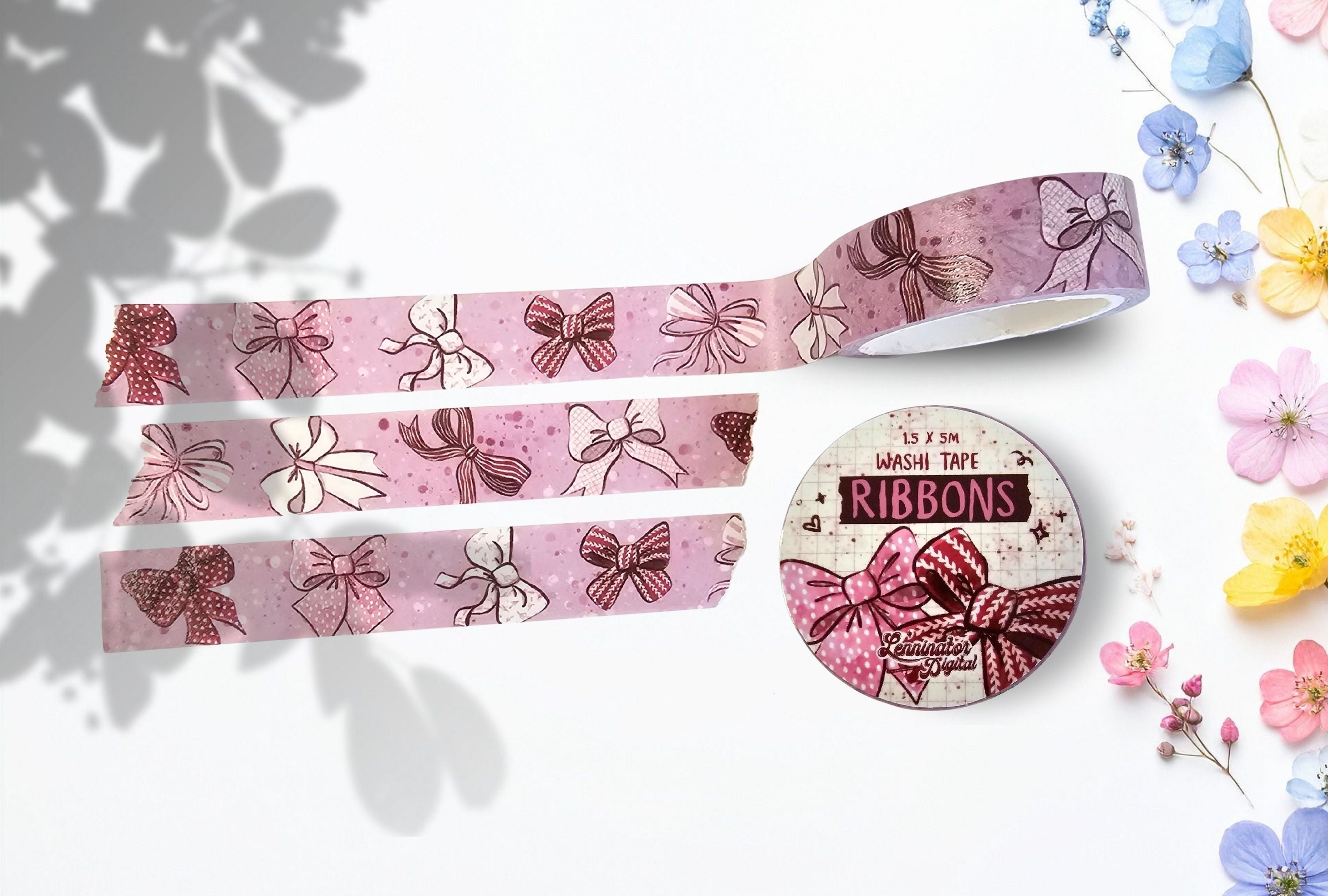 A roll of pink washi tape decorated with cute ribbons