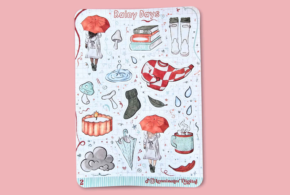 A rectangular sticker sheet titled 'Rainy Days' featuring watercolor-style illustrations of umbrellas, rain boots, a checkered scarf, a mug, mushrooms, books, and other rainy-day motifs, displayed on a solid pink background.