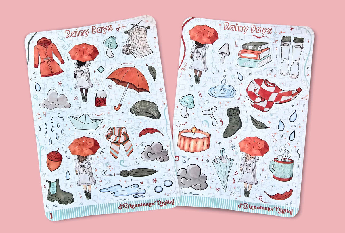 Two illustrated sticker sheets titled 'Rainy Days' displayed on a pink background. The sheets feature watercolor-style drawings of umbrellas, rain boots, rain hats, raincoats, rainclouds, raindrops, a mug, books, and other rainy-day themed items.