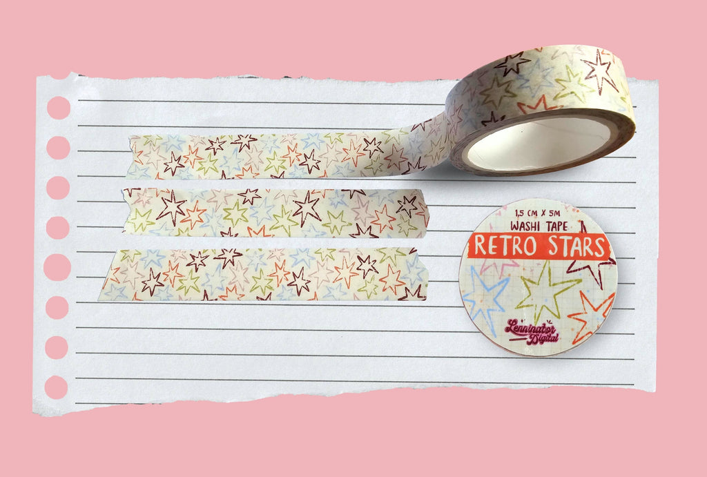 Roll of retro star-patterned washi tape on a pink background