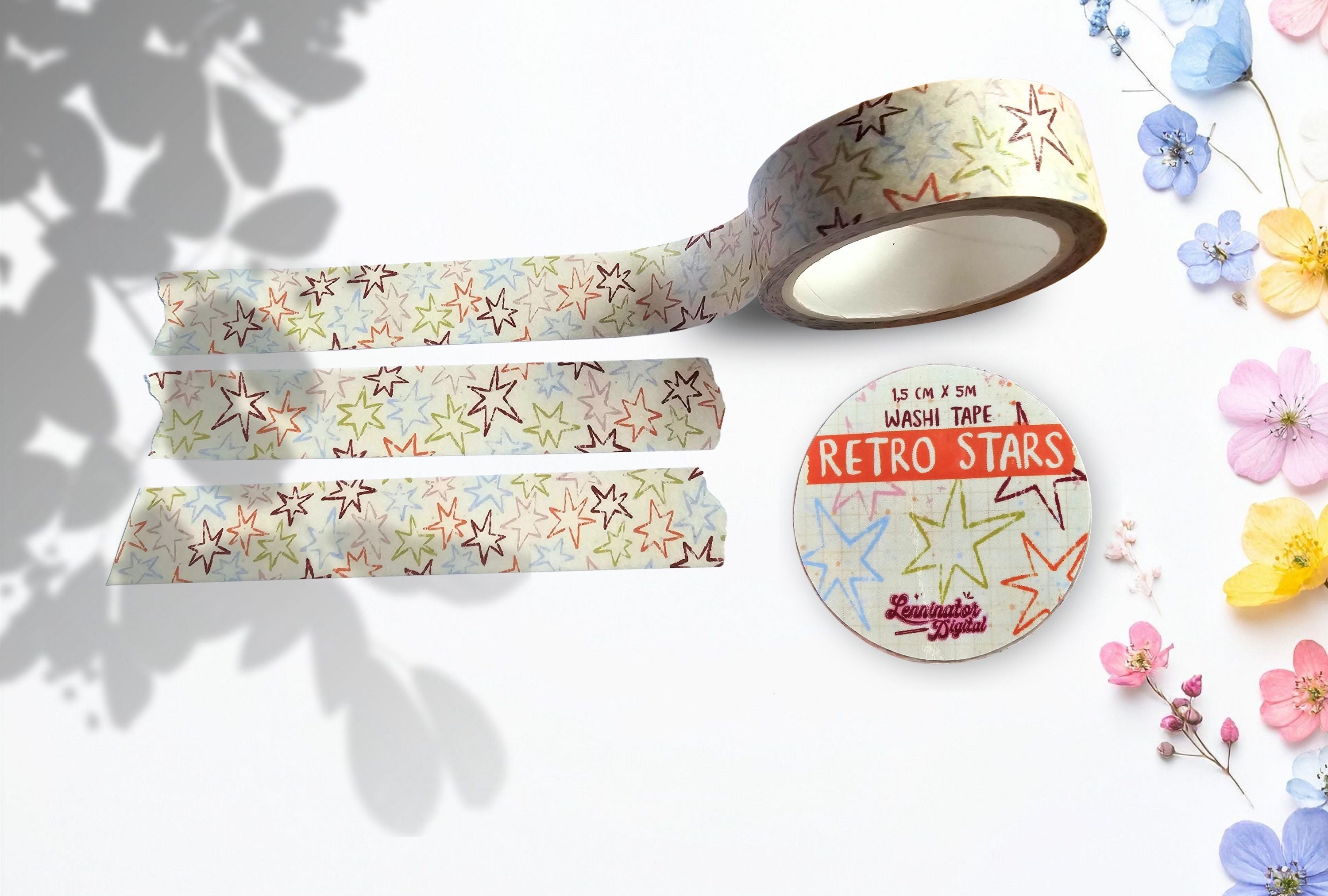 Decorative washi tape with 'Retro Stars' design on a white background with flowers.