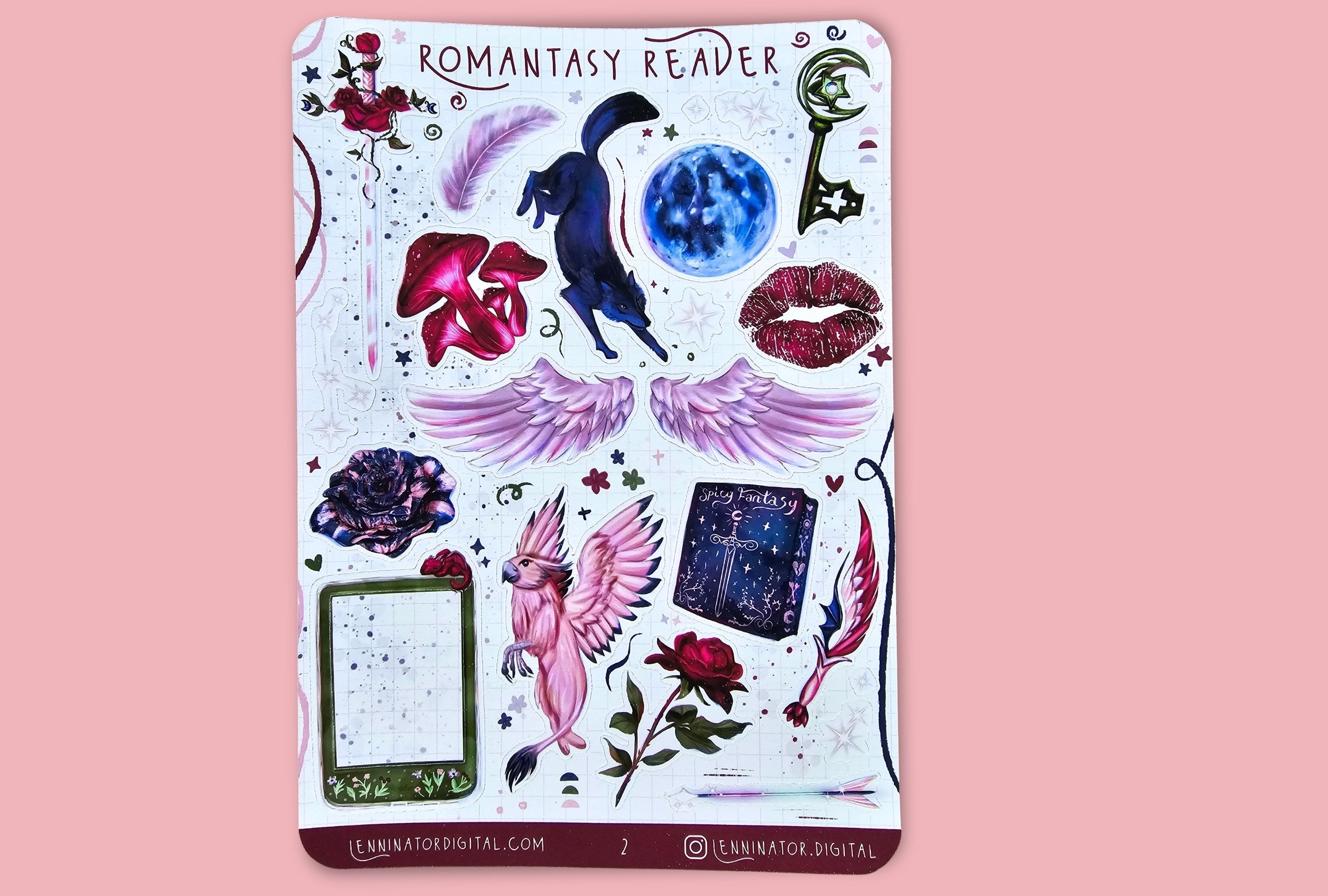 A rectangular sticker sheet titled 'ROMANTASY READER' featuring various illustrated stickers including a blue cat, pink and red roses, wings, lips, a key, a card, and decorative text, displayed against a solid pink background.