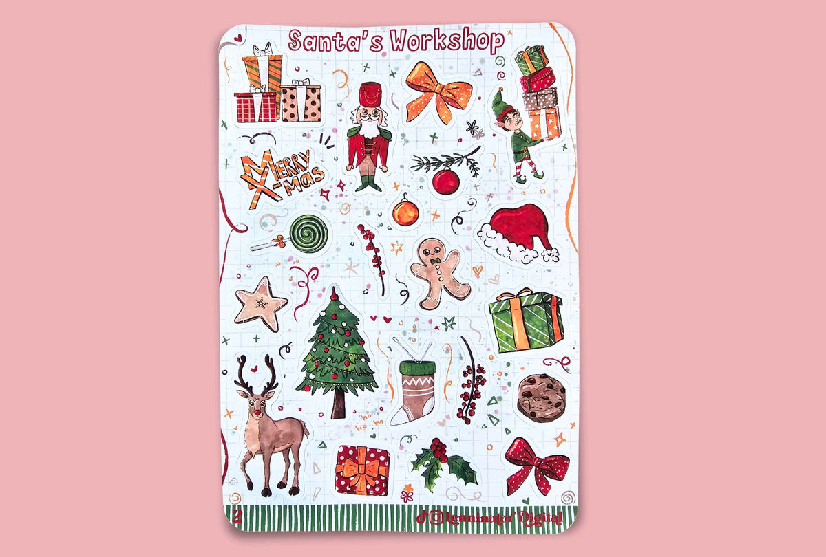 A rectangular white sticker sheet featuring various Christmas illustrations such as a Santa Claus, reindeer, Christmas tree, gifts, ornaments, and bows, with the text 'Santa's Workshop' at the top, displayed against a solid pink background.