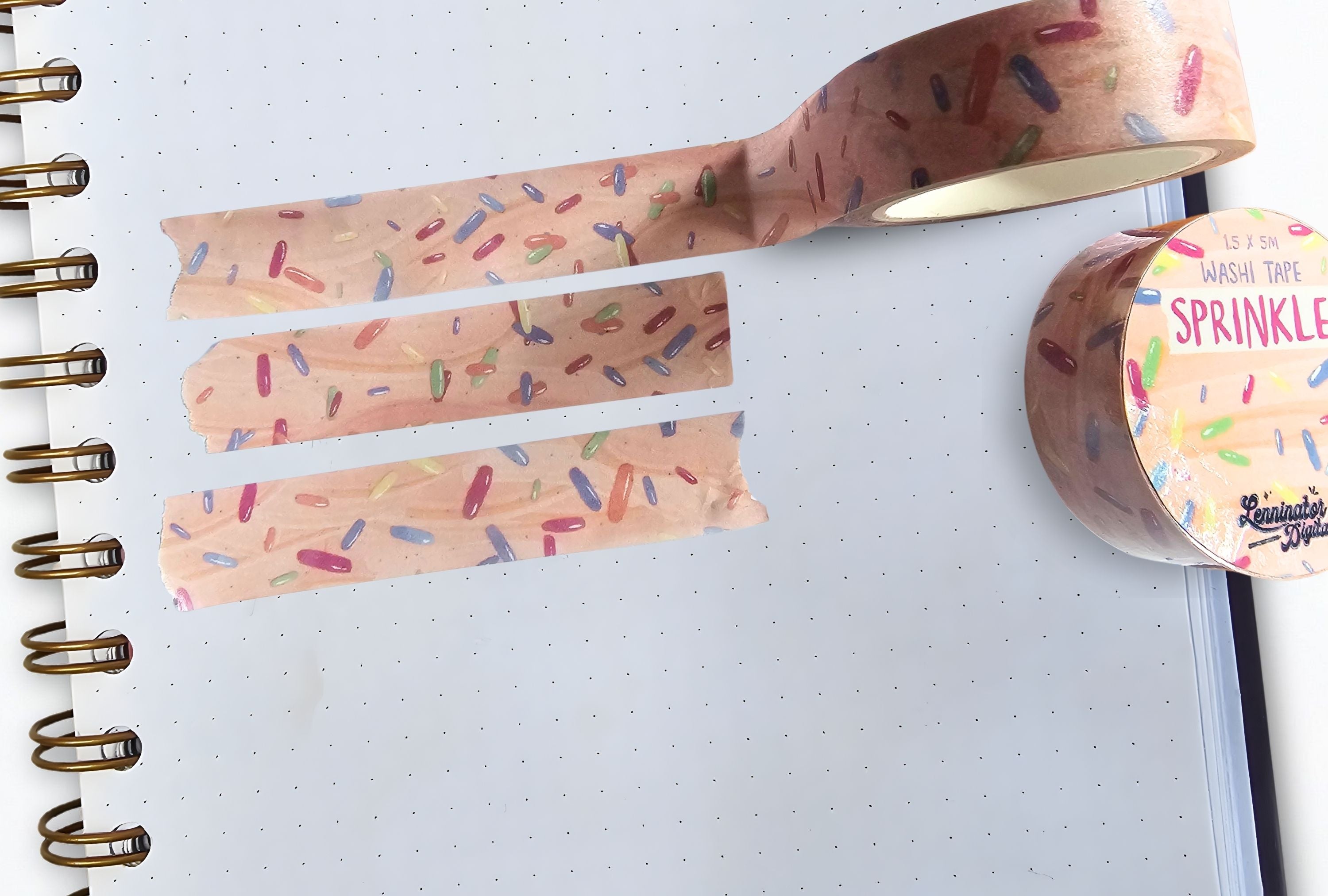 Decorative washi tape with sprinkles design on a notebook page