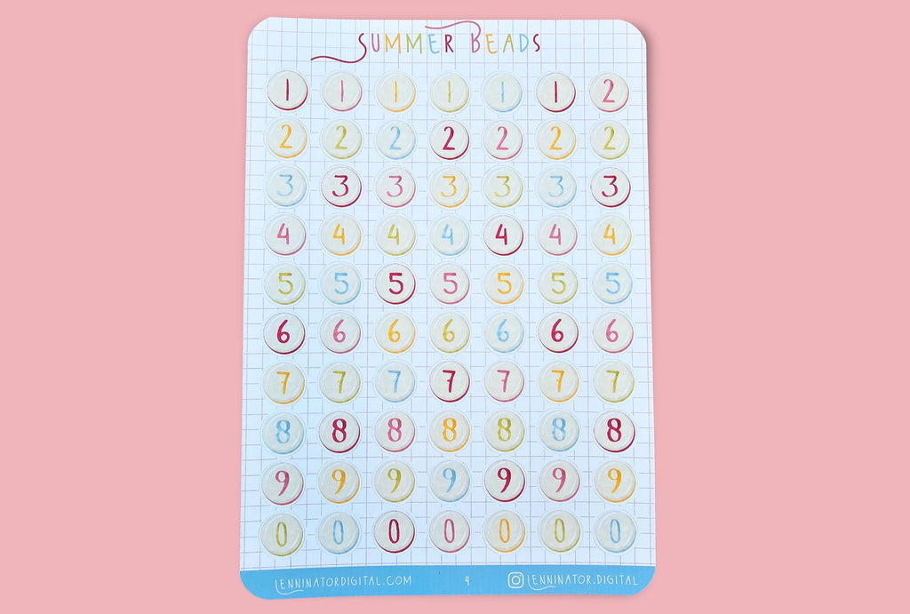 Pack of colorful number beads on a pink background