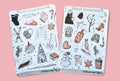 Two planner sticker sheets featuring a winter theme with illustrations of snow gear, candy canes, a snowman, a Christmas tree, and other seasonal icons, displayed on a solid pink background.