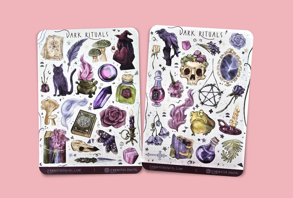 Two sticker sheets titled 'Dark Rituals' on a textured surface with various creepy gothic illustrations like skulls, black cat, wtich, potions, broken mirror, forest elements, tarot cards, crystals, candles