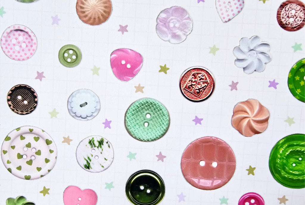 close up of colorful buttons stickers on a white background